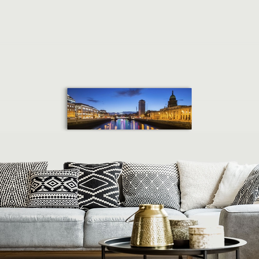 A bohemian room featuring Panoramic photograph going straight down the River Liffey with buildings, highlighting The Custom...
