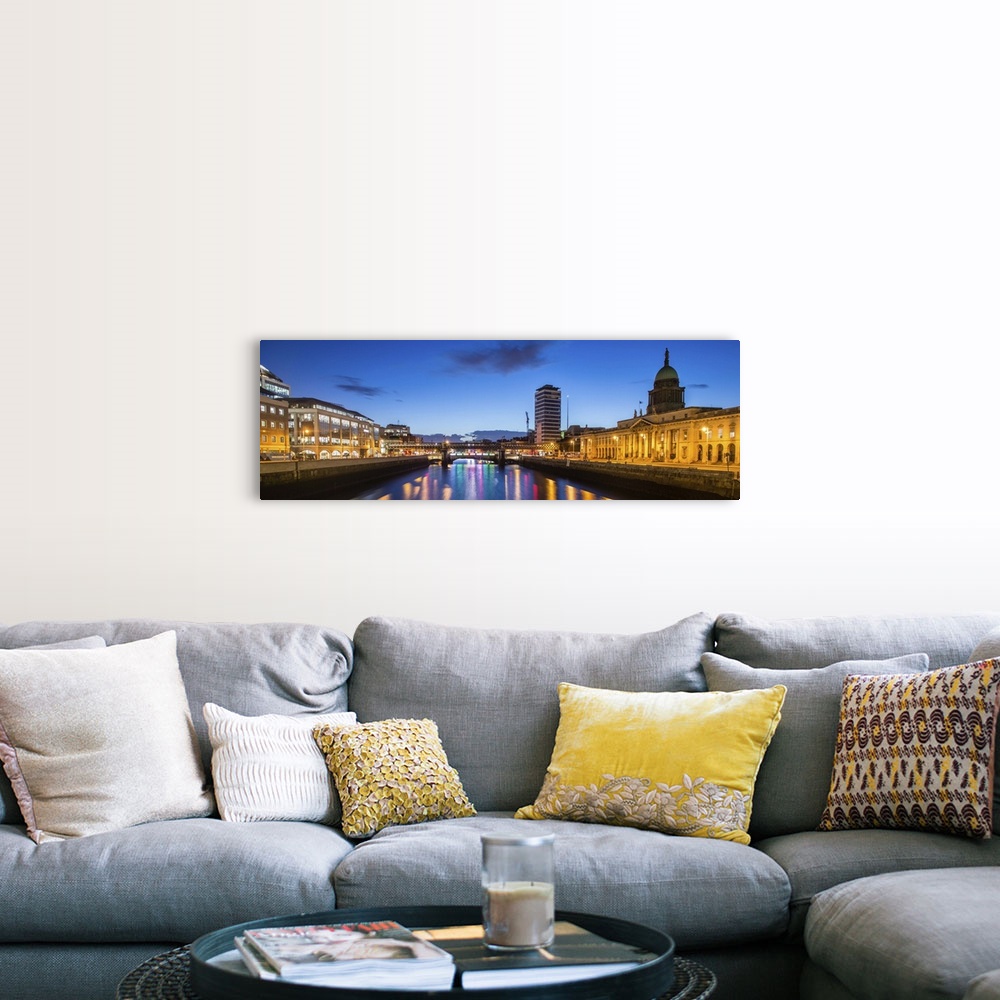 A farmhouse room featuring Panoramic photograph going straight down the River Liffey with buildings, highlighting The Custom...