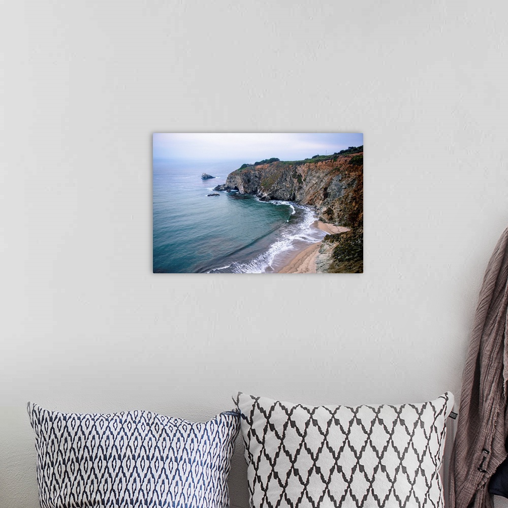 A bohemian room featuring View of Rocky Creek Bridge beach landscape in Monterey County, California.