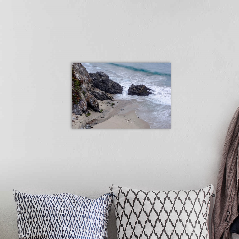 A bohemian room featuring View of Rocky Creek Bridge beach rocks in Monterey County, California.