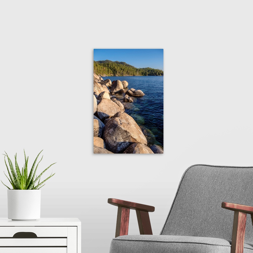 A modern room featuring View of a large boulders on the shoreline of Lake Tahoe in California and Nevada.