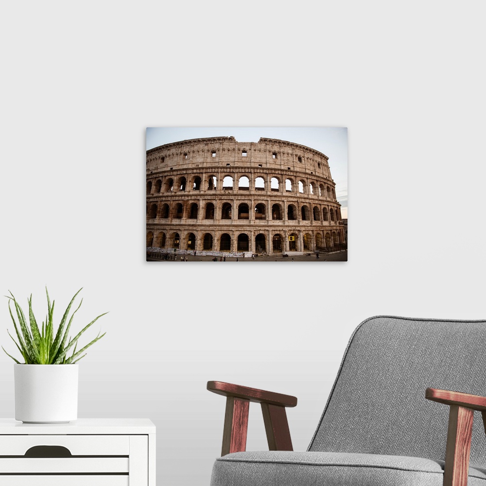 A modern room featuring Photograph of the Colosseum in Rome.