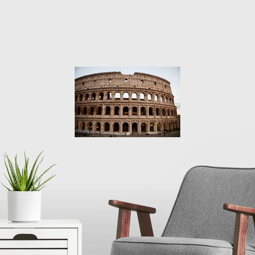 A modern room featuring Photograph of the Colosseum in Rome.