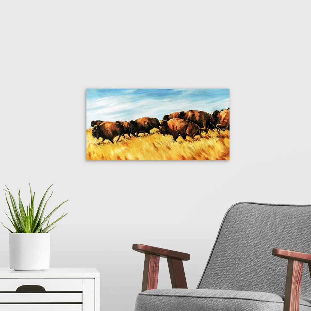 A modern room featuring Painting of a herd of buffalo running wild on a grassy plain.