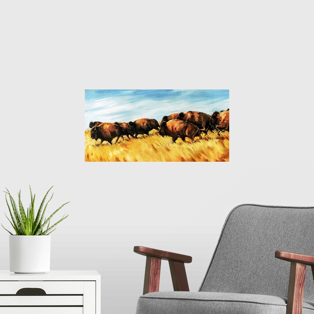 A modern room featuring Painting of a herd of buffalo running wild on a grassy plain.