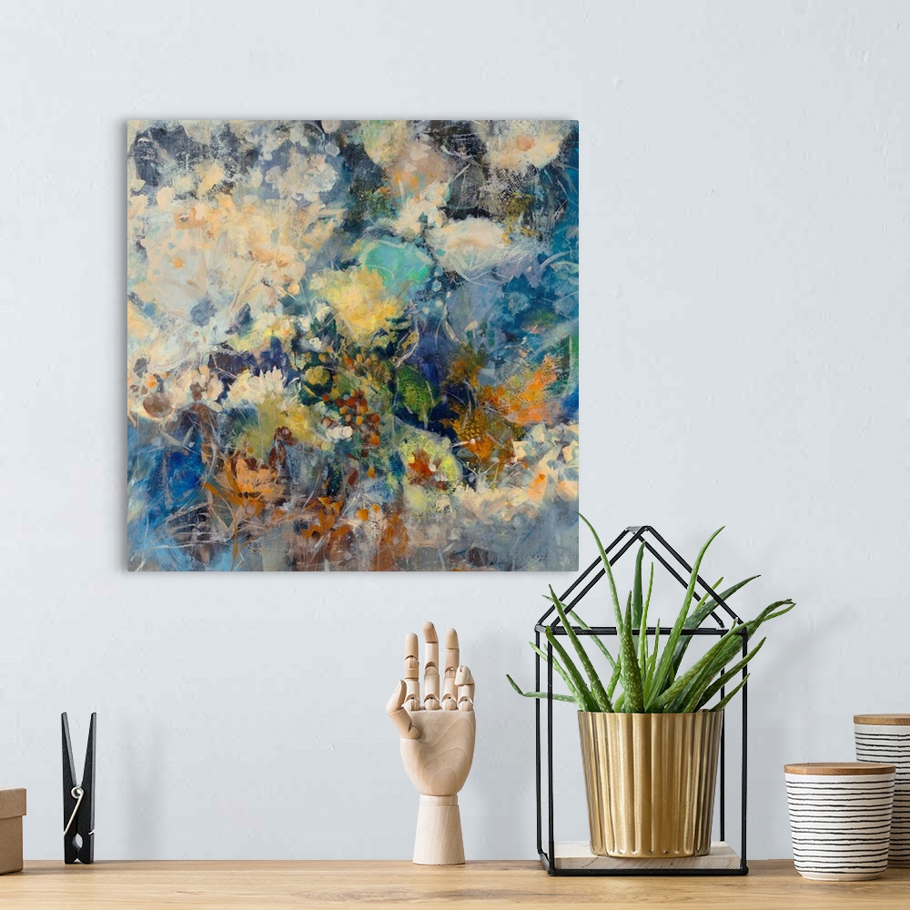 A bohemian room featuring Huge abstract art depicts a large assortment of flowers mixed together through the use of numerou...