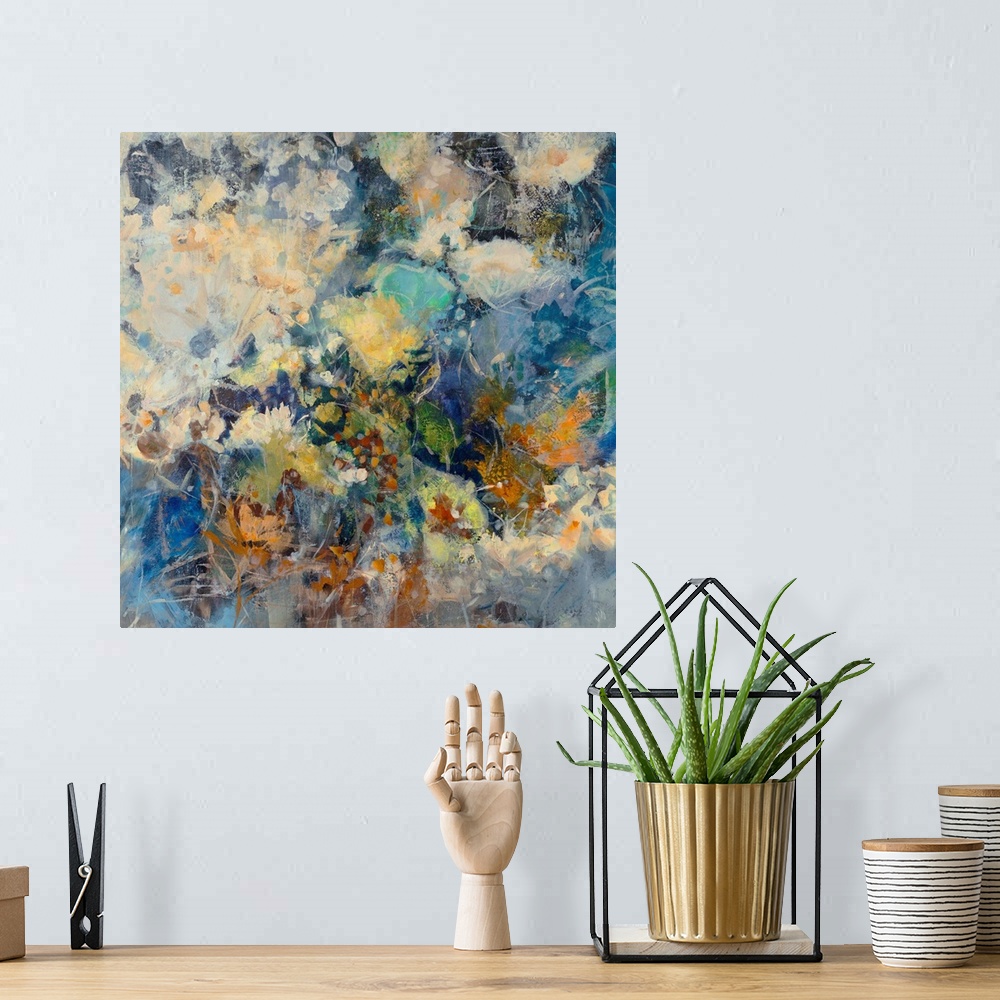 A bohemian room featuring Huge abstract art depicts a large assortment of flowers mixed together through the use of numerou...