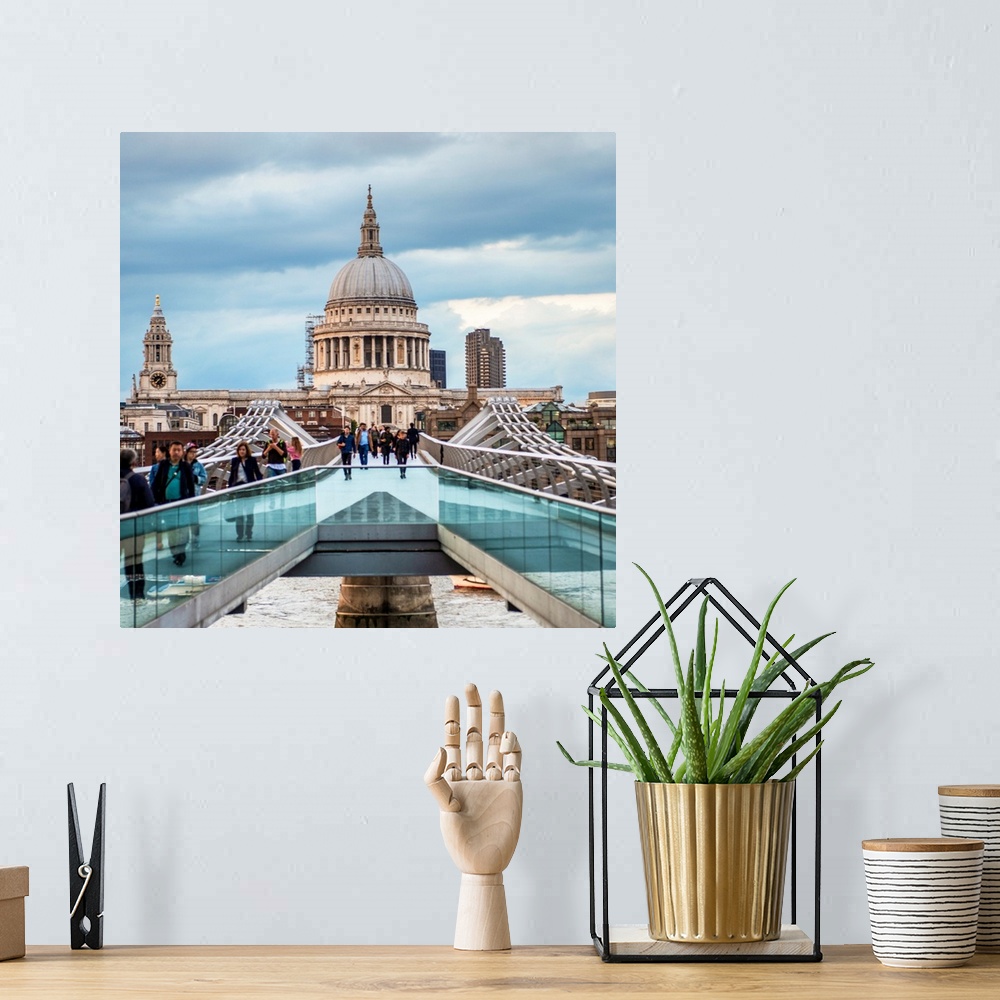 A bohemian room featuring Square photograph of Saint Paul's Cathedral taken from the Millennium Bridge in London, England.