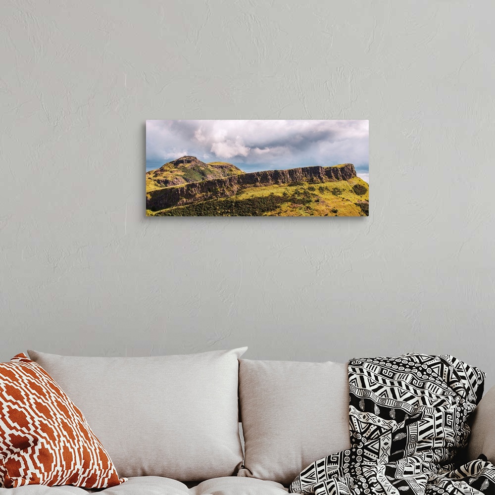 A bohemian room featuring View of Salisbury Crags cliff at Arthur's Seat and Holyrood Park in Edinburgh, Scotland.