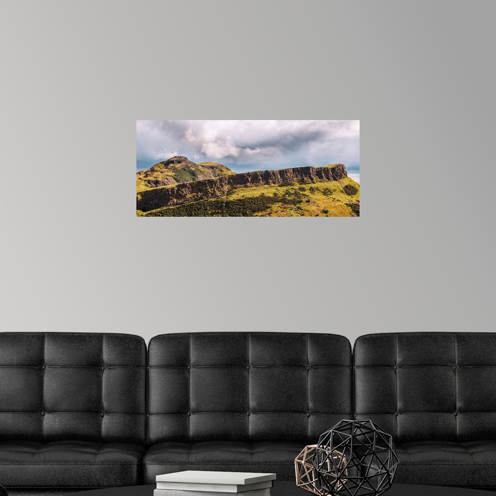 A modern room featuring View of Salisbury Crags cliff at Arthur's Seat and Holyrood Park in Edinburgh, Scotland.