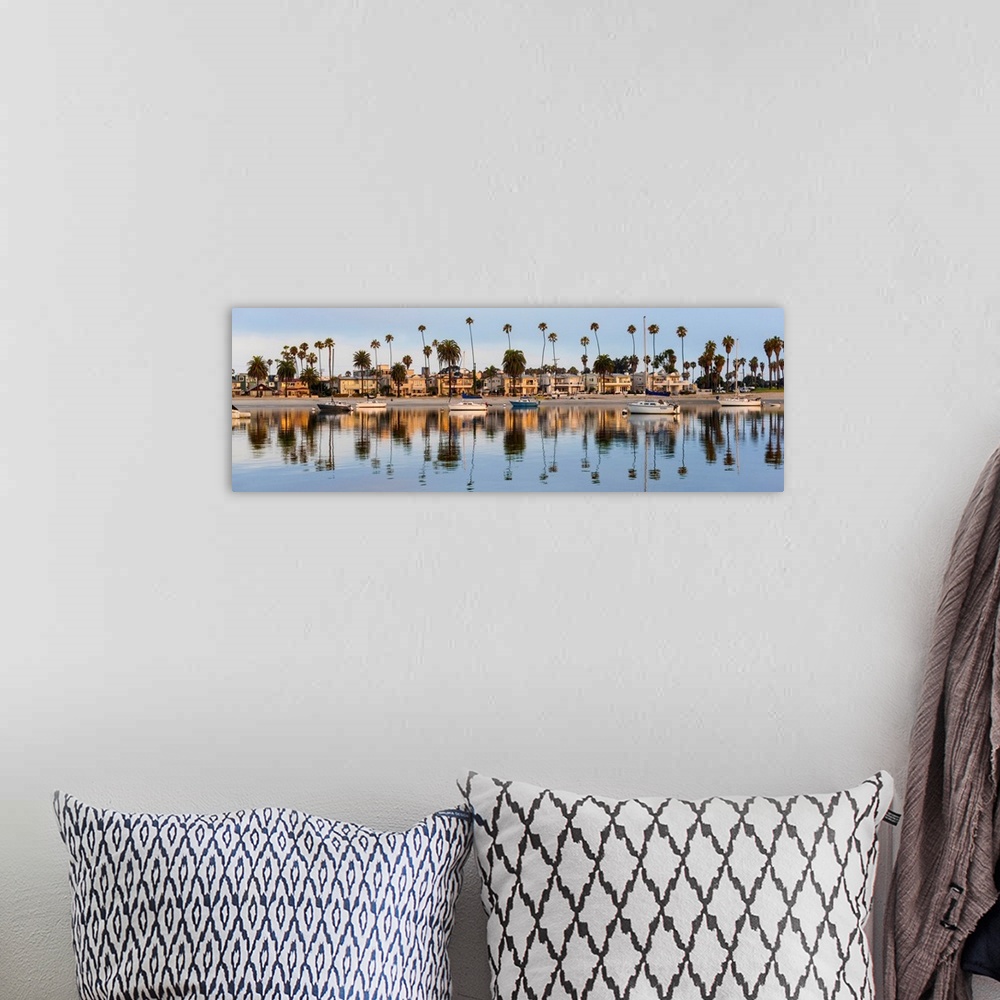 A bohemian room featuring Panoramic photograph of beach houses, palm trees, and boats on the San Diego coast reflecting int...