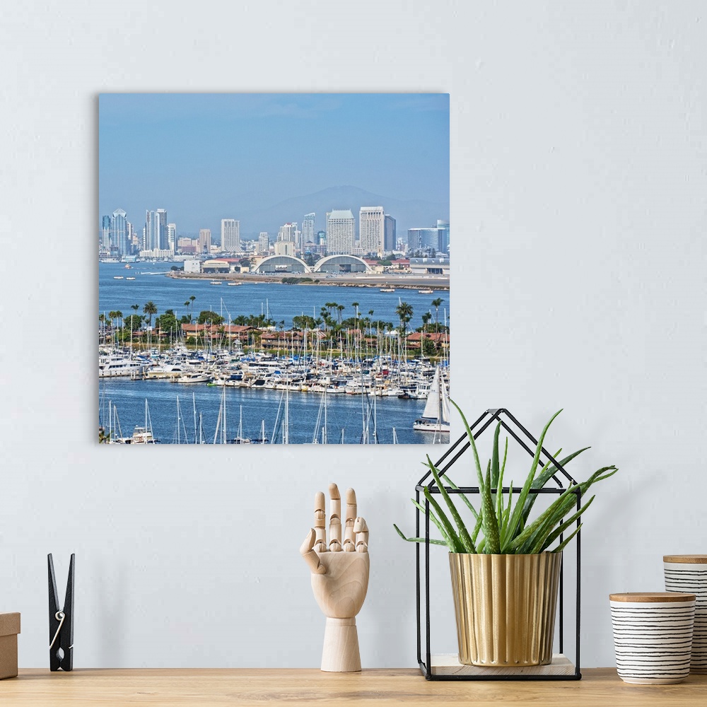 A bohemian room featuring Square photograph of the San Diego, California skyline with a marina in the foreground packed wit...