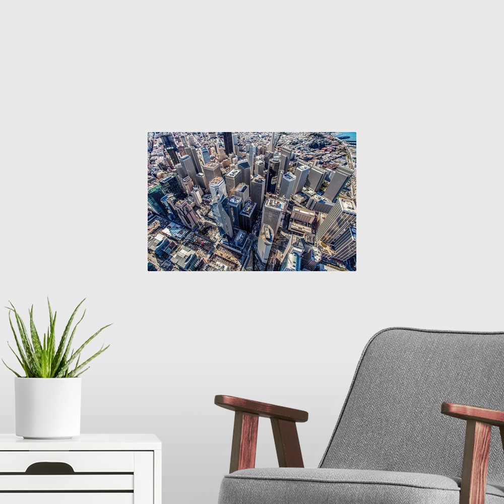 A modern room featuring Aerial photography of skyscrapers in downtown San Francisco, California.