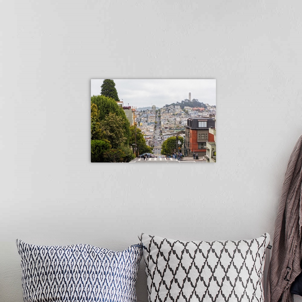 A bohemian room featuring Street view photograph of San Francisco highlighting how hilly the roads are.