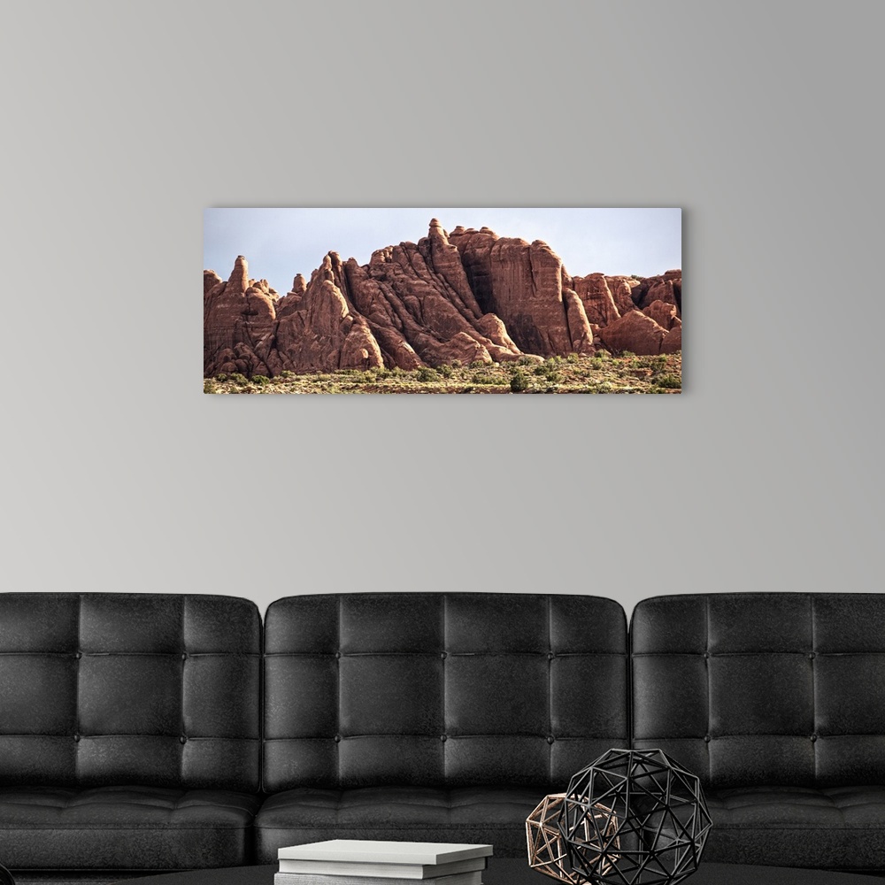 A modern room featuring Eroded sandstone fin structures in the sunlight, Arches National Park, Moab, Utah.