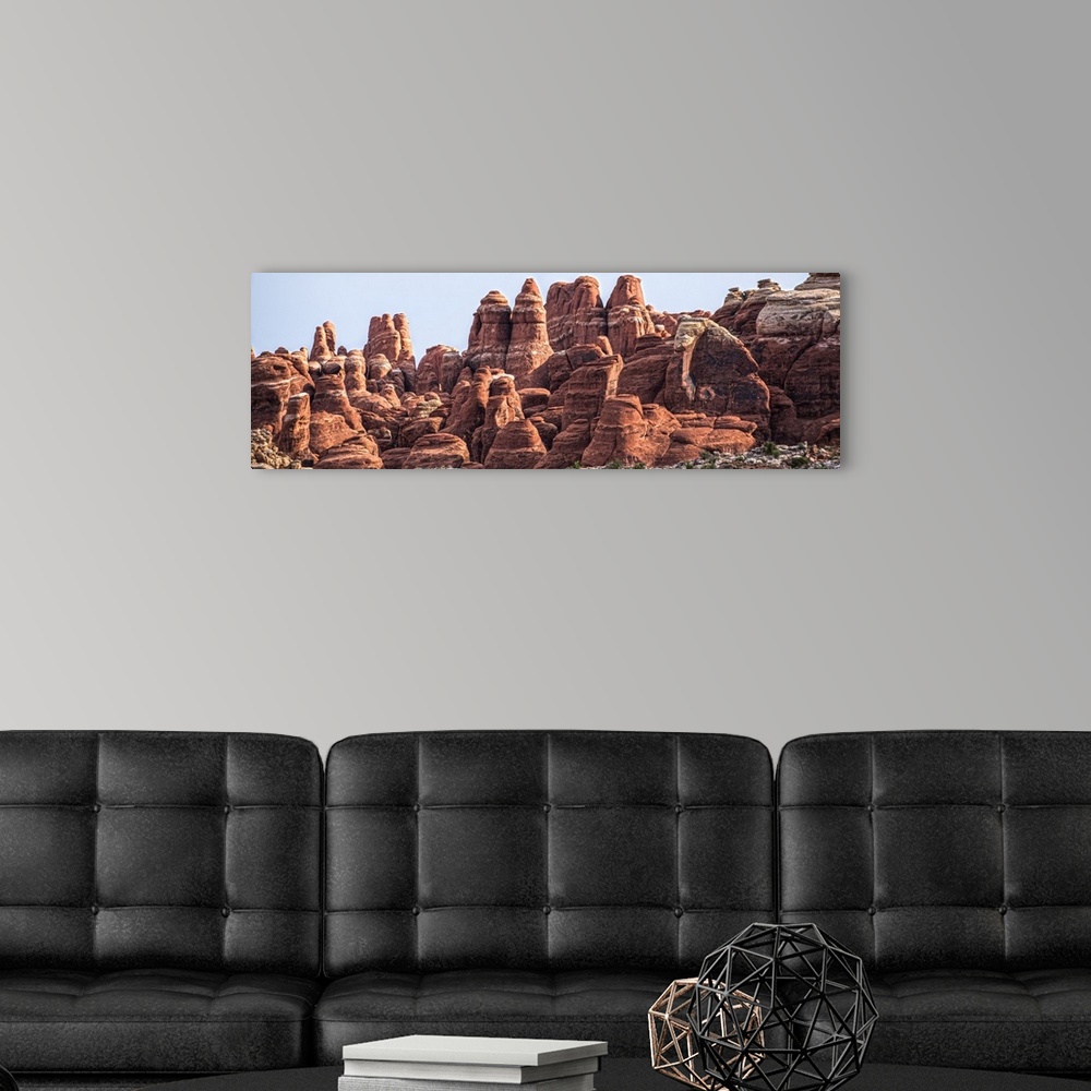 A modern room featuring Sandstone formations in the Fiery Furnace, named for their red glow in the sunlight, Arches Natio...