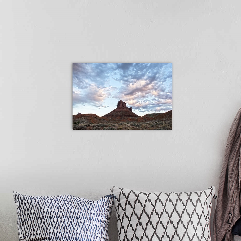 A bohemian room featuring Red sandstone tower rising over the desert landscape in Arches National Park, Utah.