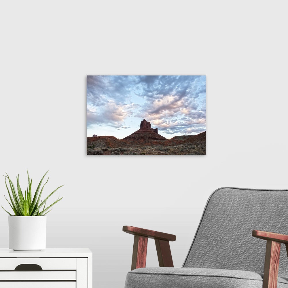 A modern room featuring Red sandstone tower rising over the desert landscape in Arches National Park, Utah.