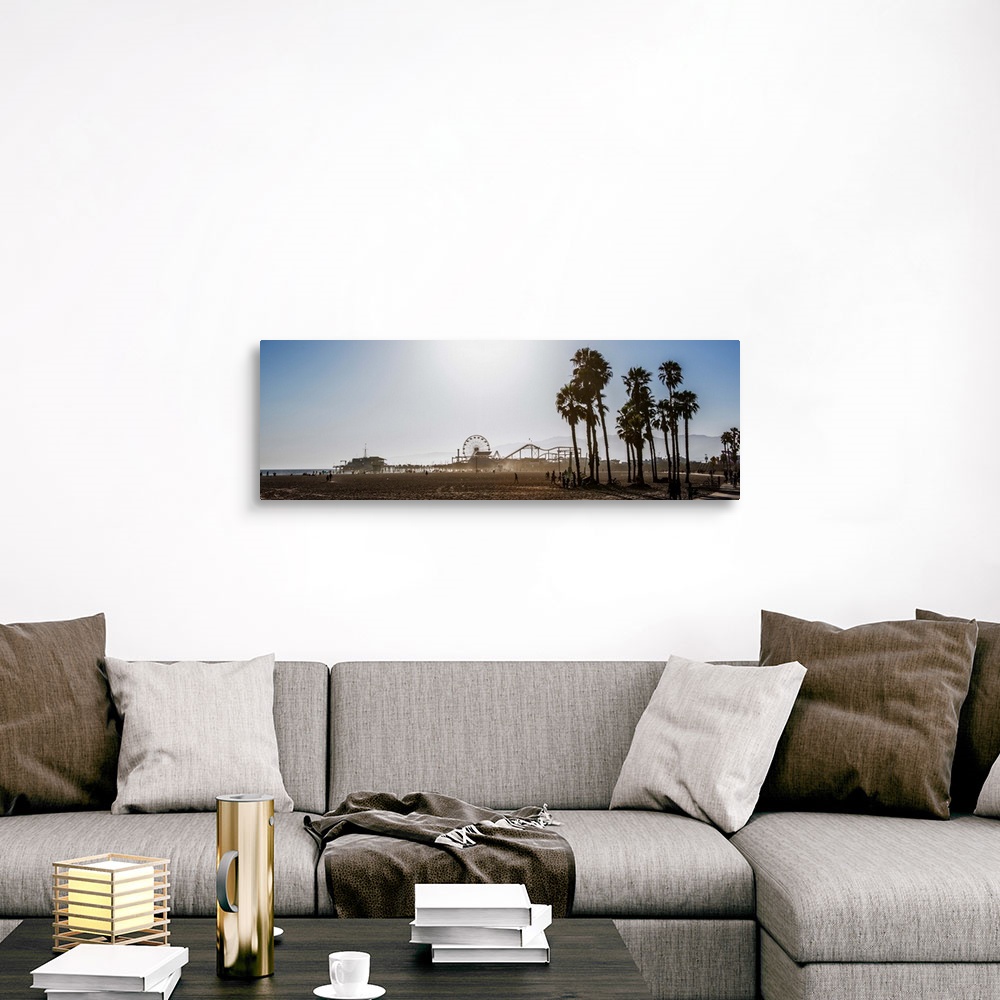 A traditional room featuring Panoramic photograph of the Santa Monica Pier in Los Angeles, California, with palm trees in the ...