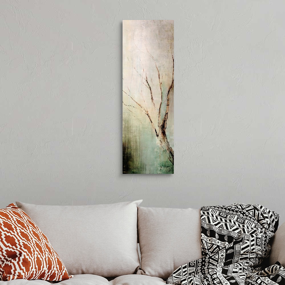 A bohemian room featuring Panoramic contemporary art depicts a lone tree branch composed of earth tones as it sits in front...