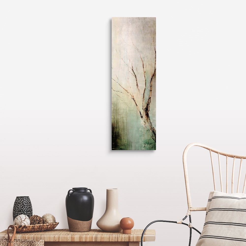 A farmhouse room featuring Panoramic contemporary art depicts a lone tree branch composed of earth tones as it sits in front...