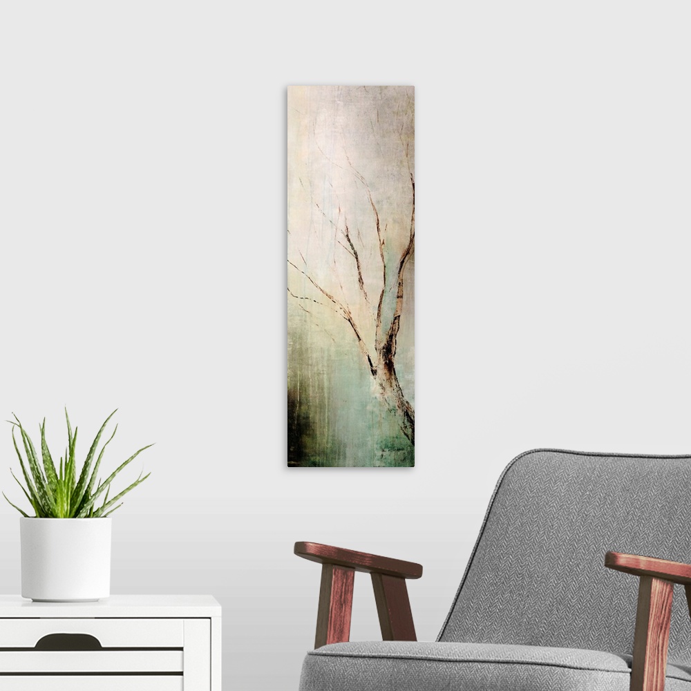 A modern room featuring Panoramic contemporary art depicts a lone tree branch composed of earth tones as it sits in front...