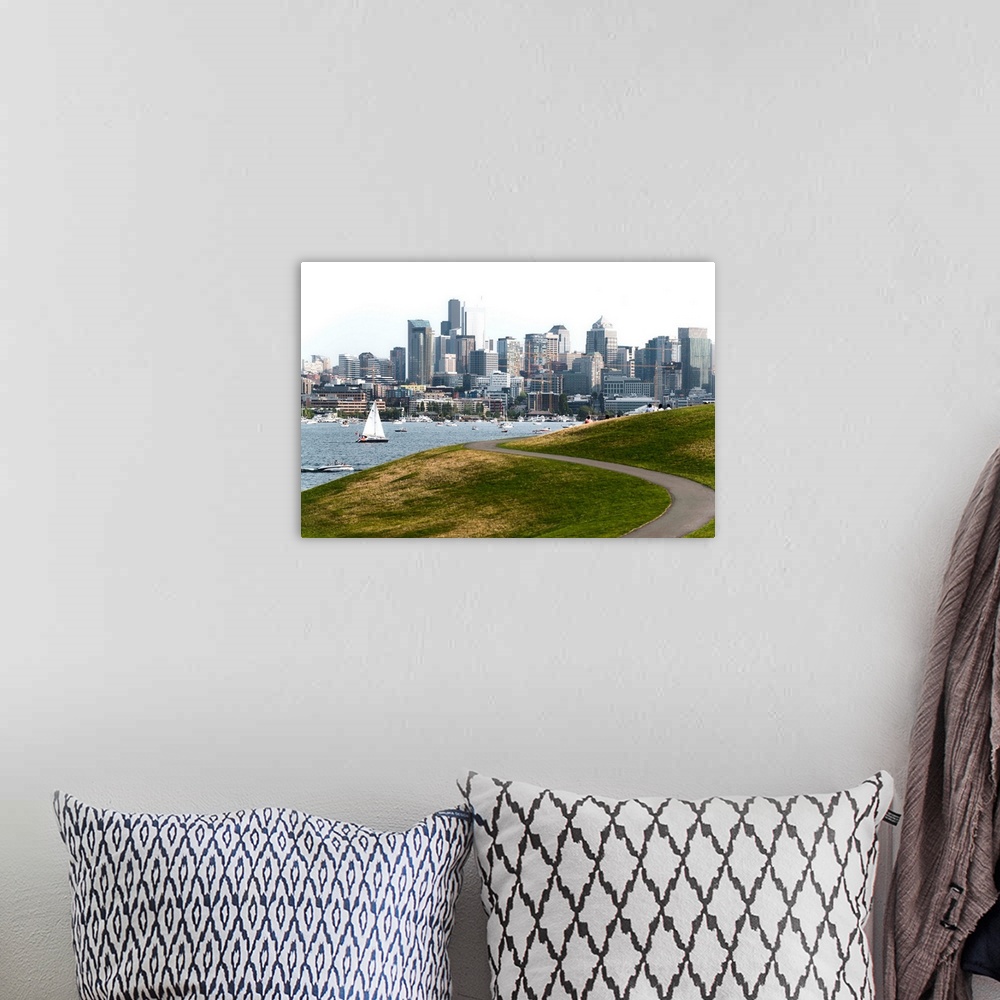 A bohemian room featuring Photograph of the Seattle skyline with Lake Washington filled with boats in front.