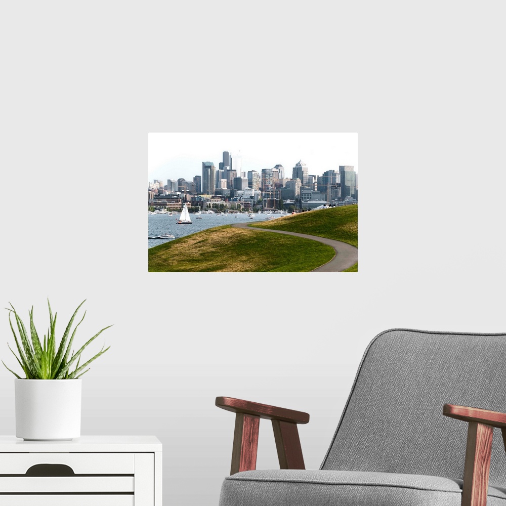 A modern room featuring Photograph of the Seattle skyline with Lake Washington filled with boats in front.
