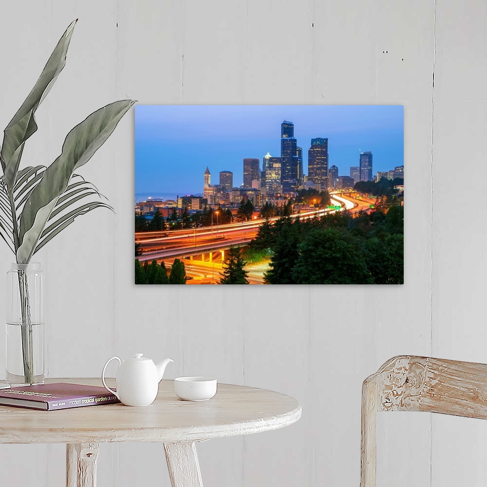 A farmhouse room featuring Photograph of the Seattle skyline at dusk with light trails from the cars on the highway in the f...