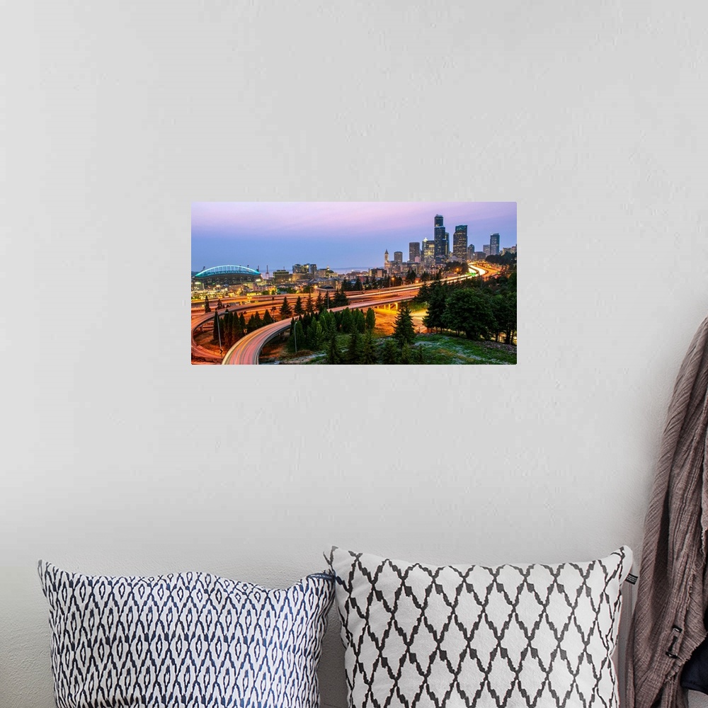 A bohemian room featuring Panoramic photograph of the Seattle skyline at night with light trails from the car lights on the...