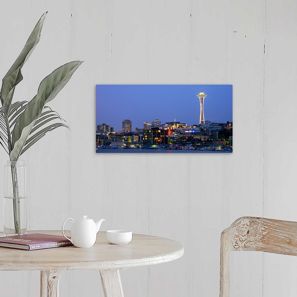 A farmhouse room featuring Panoramic photograph of the Seattle skyline lit up at night from the water.