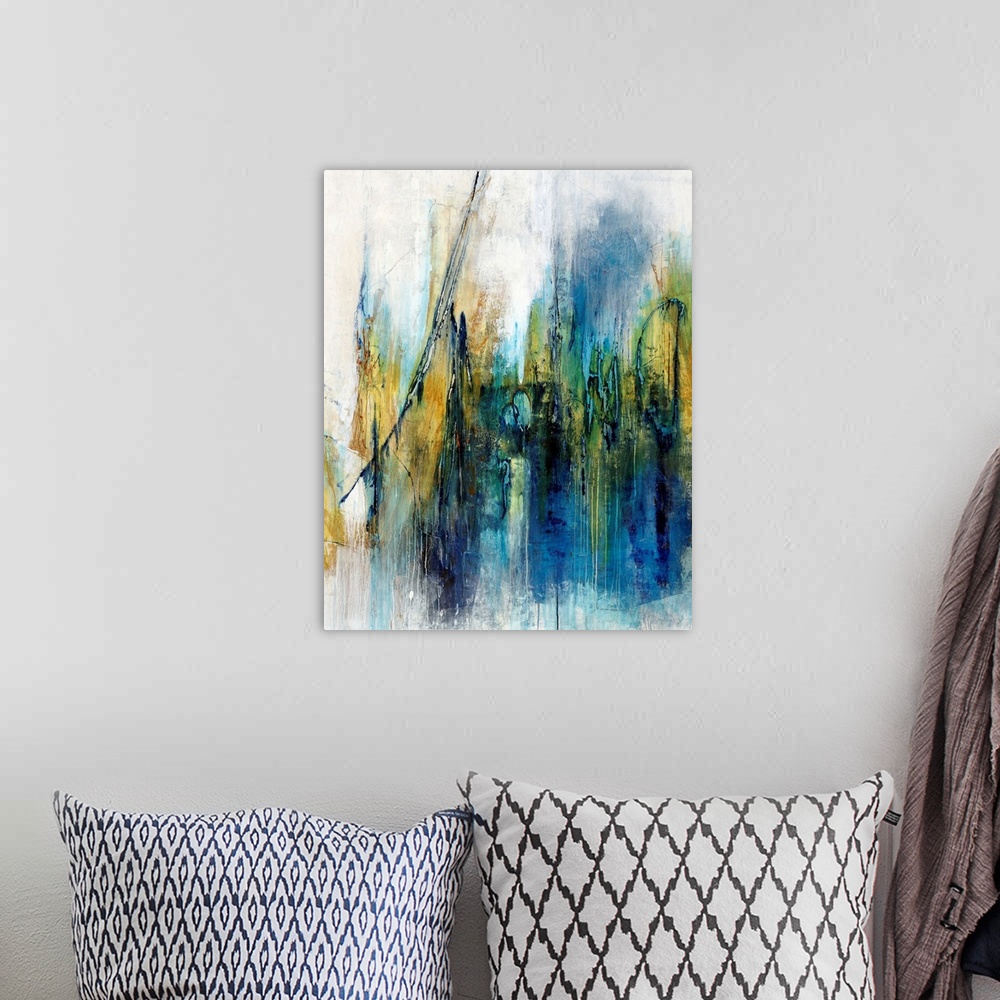 A bohemian room featuring Contemporary abstract painting using blue mixed with gold in swiping vertical swipes, against a n...