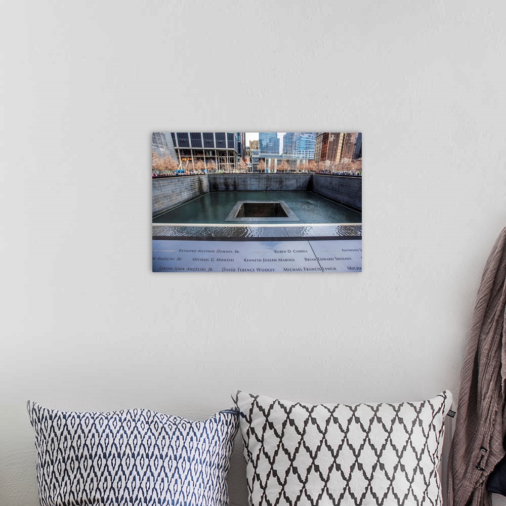 A bohemian room featuring View of 9/11 Memorial South Pool in New York City.