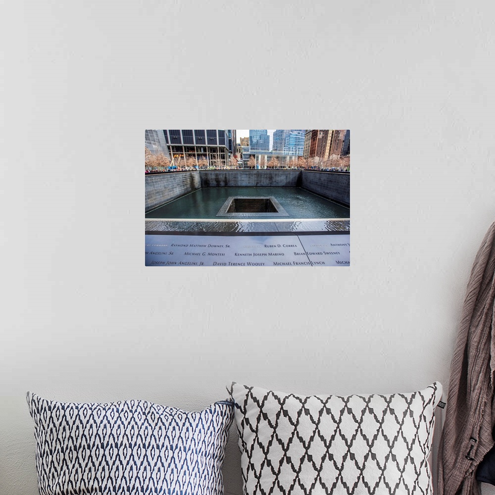 A bohemian room featuring View of 9/11 Memorial South Pool in New York City.