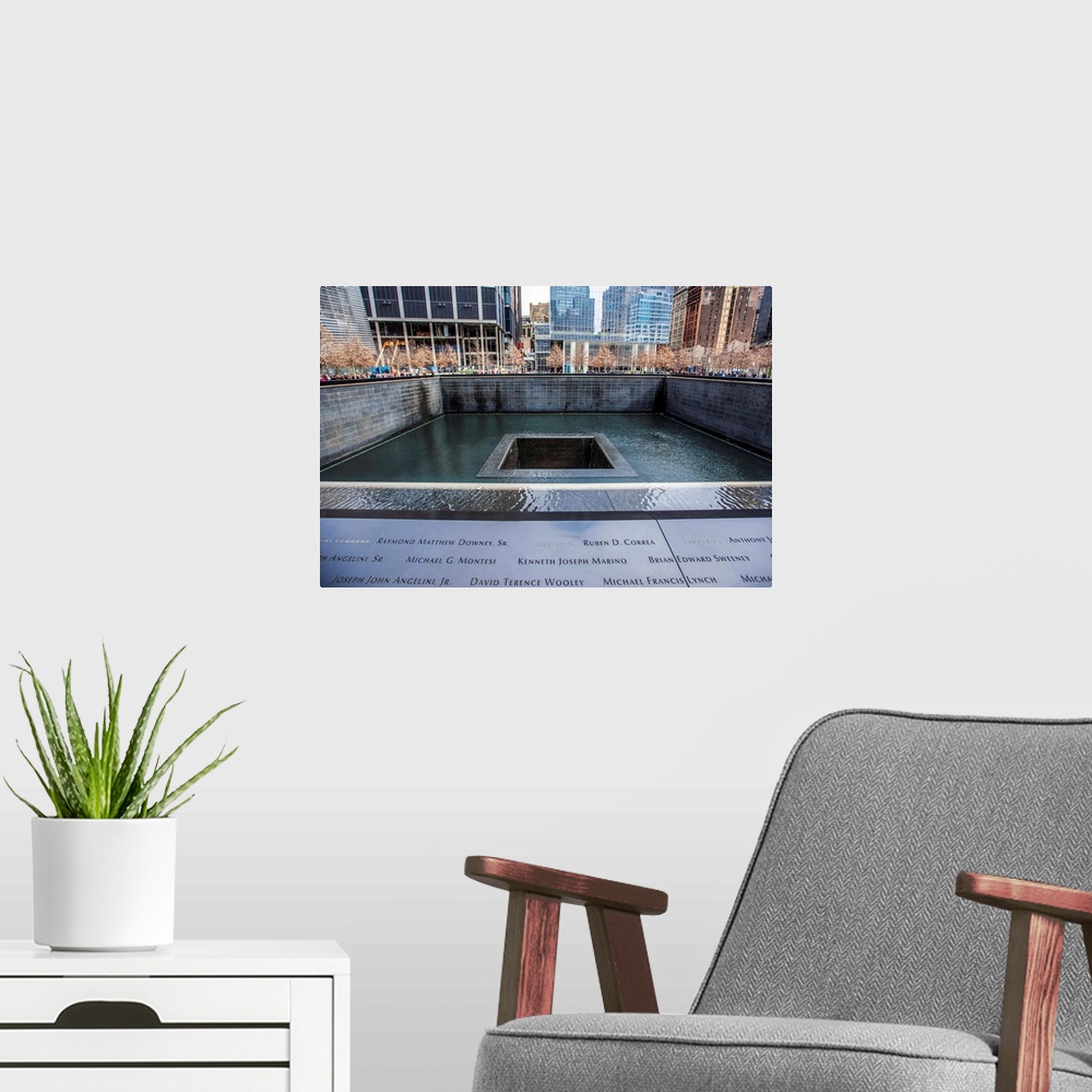 A modern room featuring View of 9/11 Memorial South Pool in New York City.