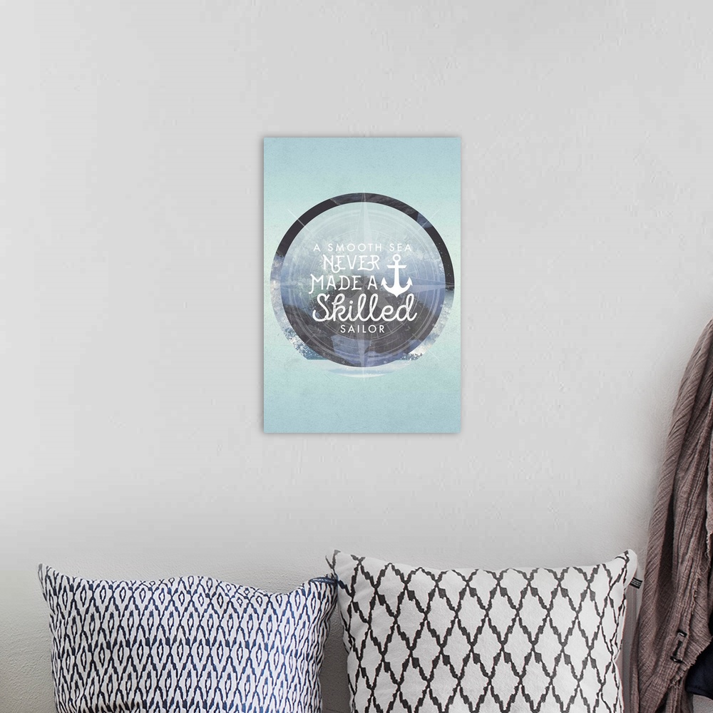 A bohemian room featuring Typography artwork against a photograph of the sea.