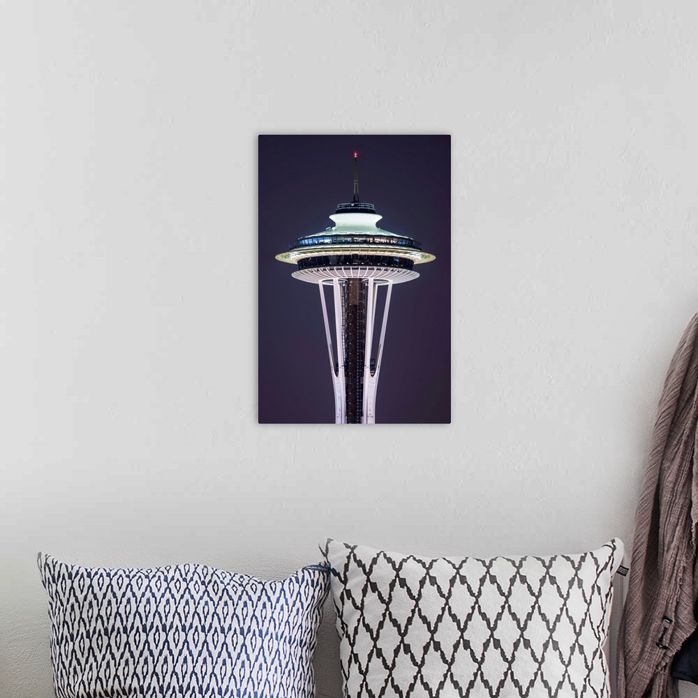A bohemian room featuring Photograph of the Seattle Space Needle lit up at night with dark purple skies in the background.