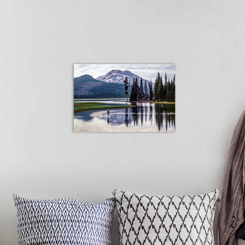 A bohemian room featuring View of a paddle board surfer at Sparks Lake with South Sister peak in the background, Deschutes ...