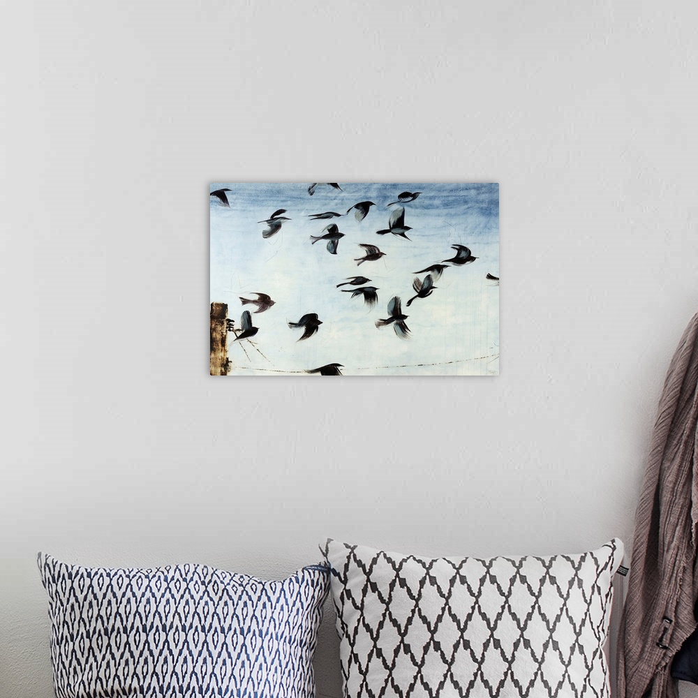 A bohemian room featuring Contemporary artwork of a flock of sparros in flight above a power line in front of a light blue ...