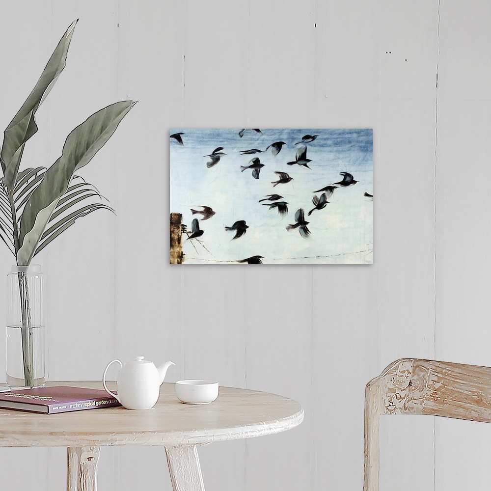 A farmhouse room featuring Contemporary artwork of a flock of sparros in flight above a power line in front of a light blue ...
