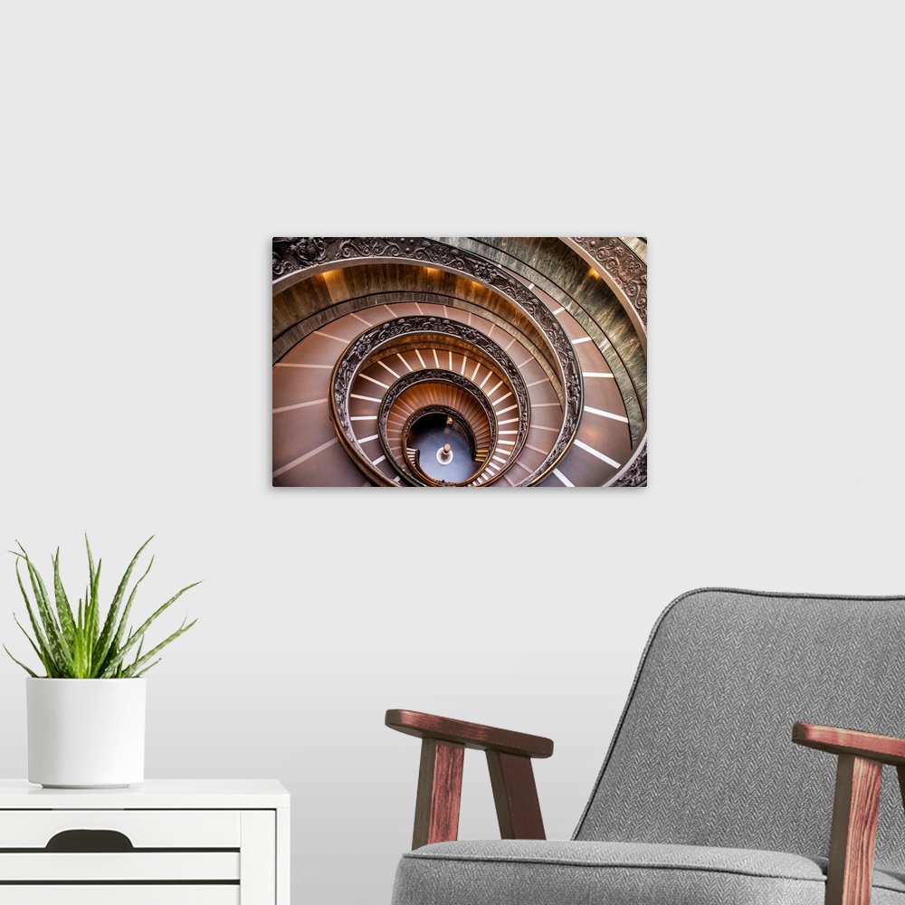 A modern room featuring Photograph of the spiral staircase at the Vatican Historical Museum.