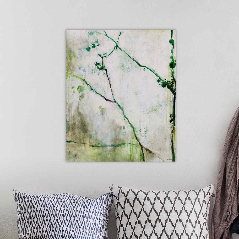 A bohemian room featuring Abstracted and simplistic painting botanical painting painted with varying shades of green.