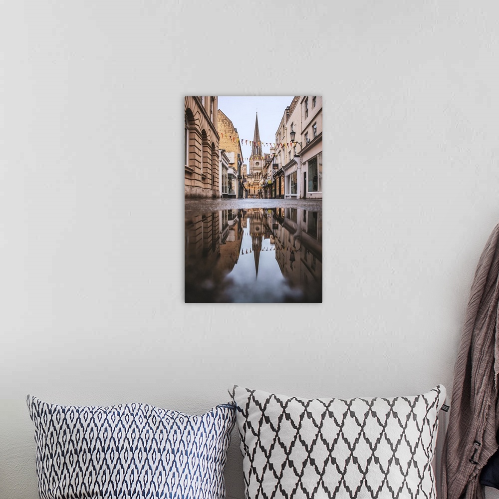 A bohemian room featuring Photograph of St. Michael's Church reflecting into a puddle in the middle of a street in Bath, En...