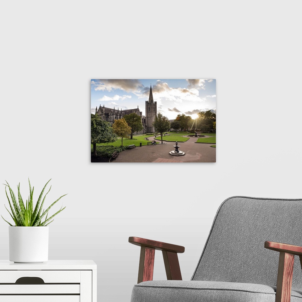 A modern room featuring Photograph of St Patrick's Cathedral in Dublin, Ireland, with a courtyard in the foreground.
