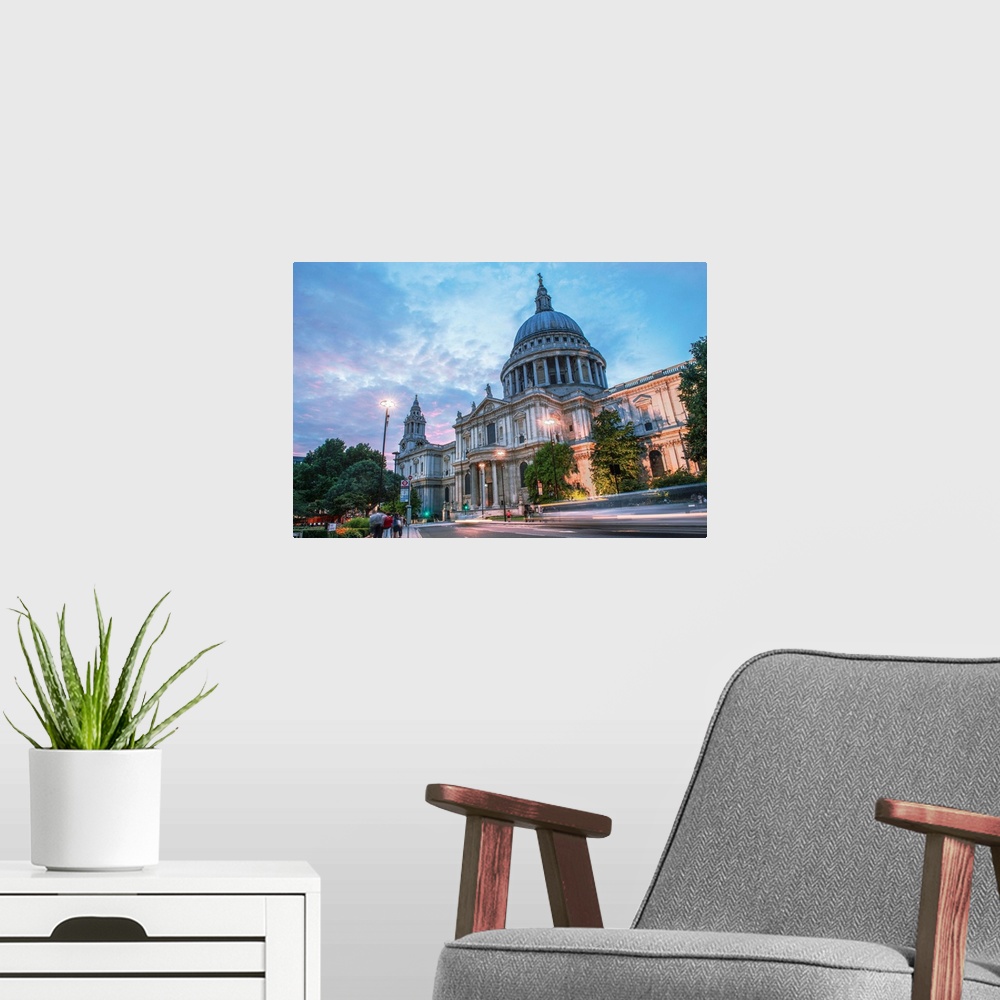 A modern room featuring View of St. Paul's Cathedral after sunset in London, England.