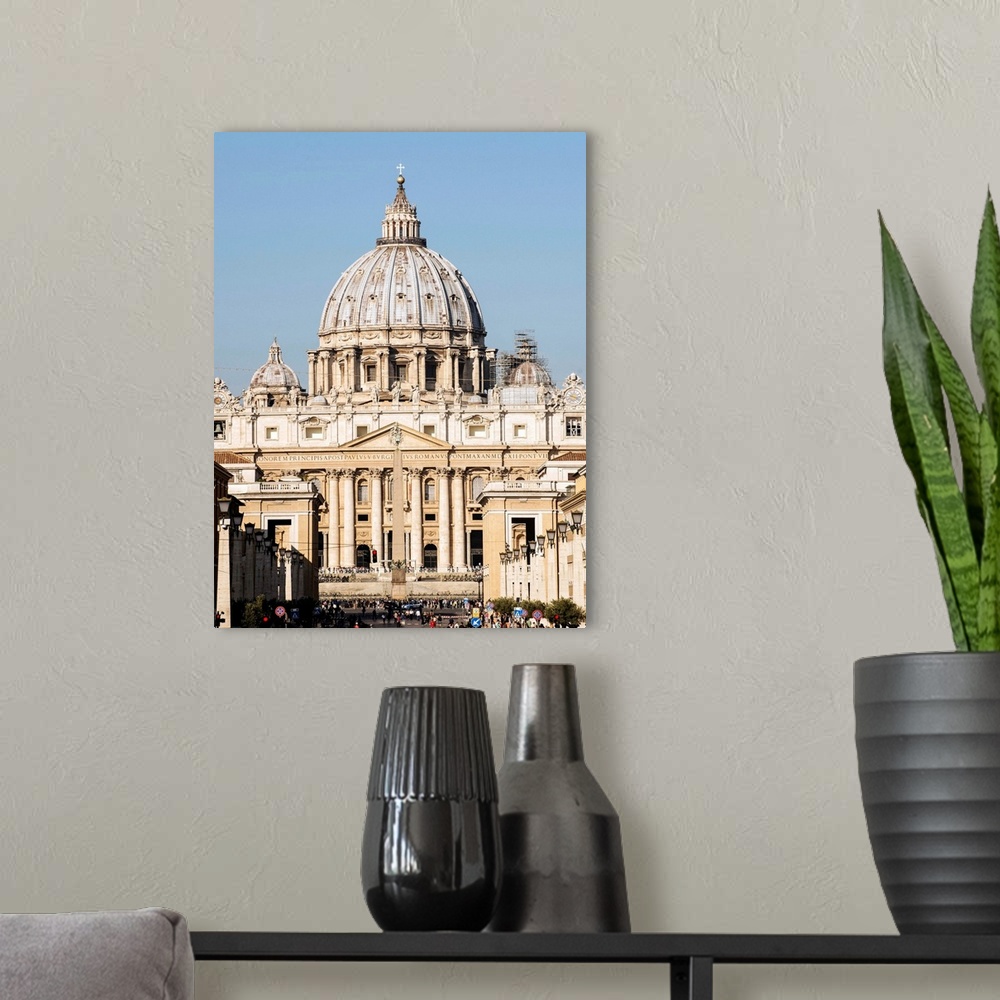 A modern room featuring Photograph of St. Peter's Basilica in Vatican City with the sun shining on it.