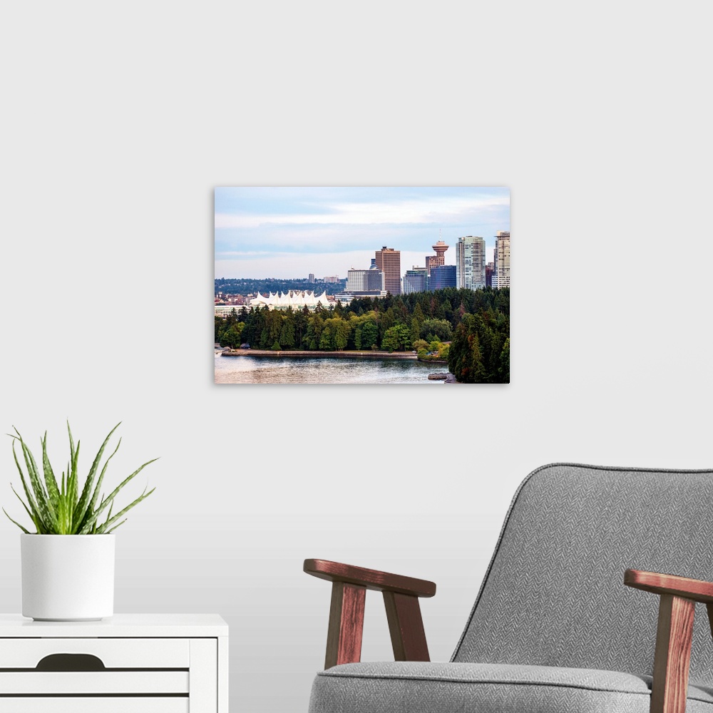 A modern room featuring View of Stanley Park Seawall Path, Canada Place and Downtown Vancouver in British Columbia, Canada.