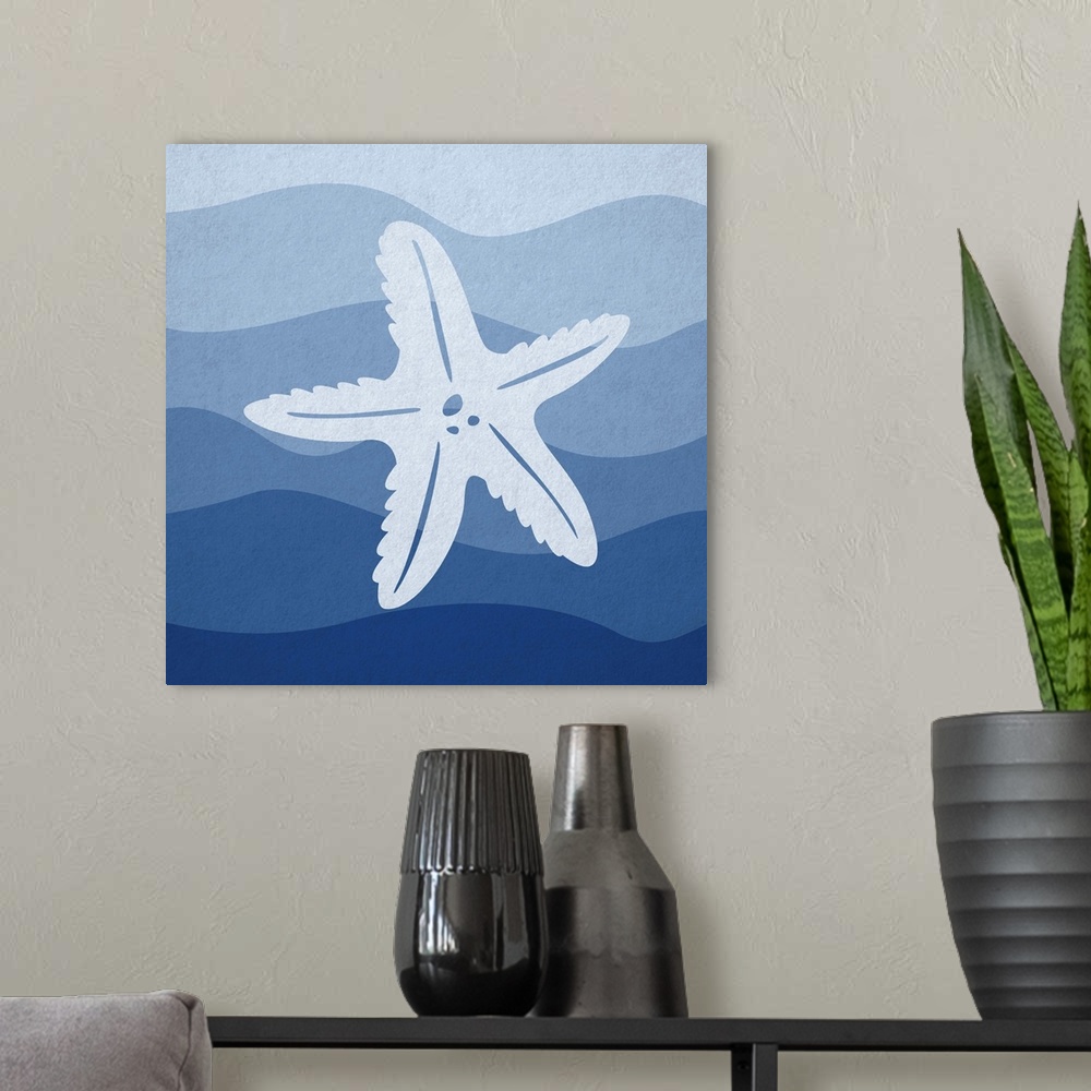 A modern room featuring Nursery art of a starfish swimming in blue waves.