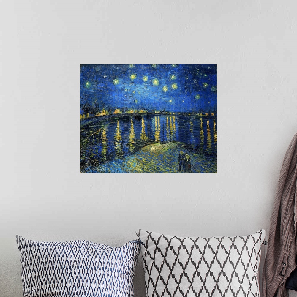 A bohemian room featuring Vincent van Gogh's Starry Night Over the Rhone (1888) famous landscape painting.