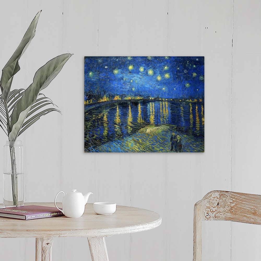A farmhouse room featuring Vincent van Gogh's Starry Night Over the Rhone (1888) famous landscape painting.